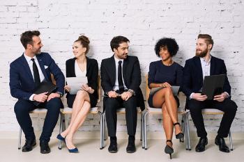 Office employees sitting together