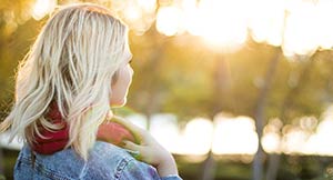 Profile picture of a girl outside in nature